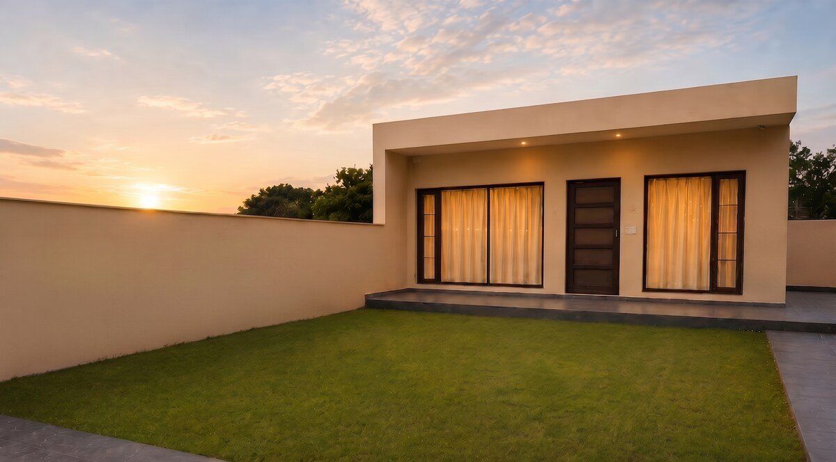Apricot Garden Care — single-storey home and private lawn at sunset
